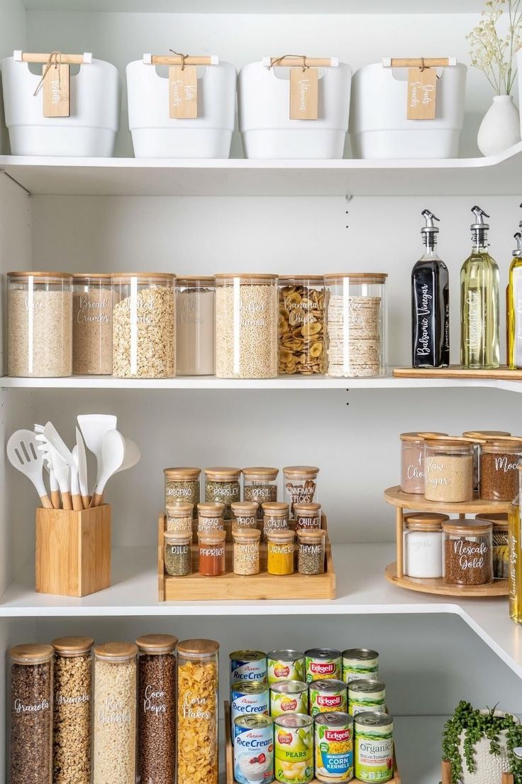 organized pantry shelves with glass storage containers
