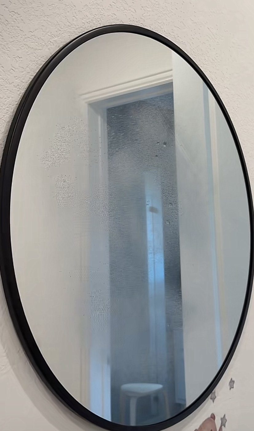 Shiny chrome stool base after cleaning with homemade window cleaner, no fingerprints